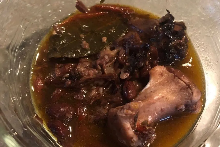 CLOSE UP PHOTO OF JAMAICAN OXTAIL WITH BLACK BEANS