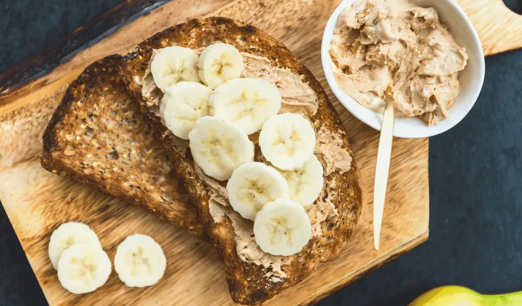 sunflower butter on toast with sliced bananas