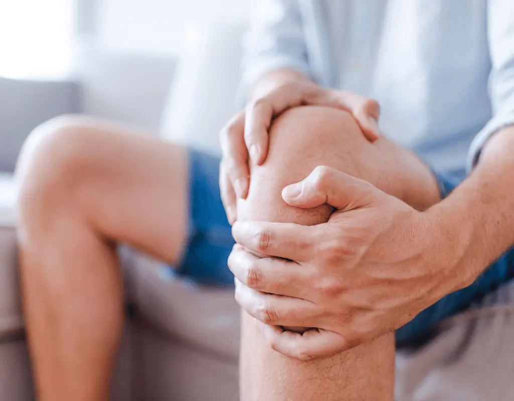 man with knee joint pain from a potato allergy