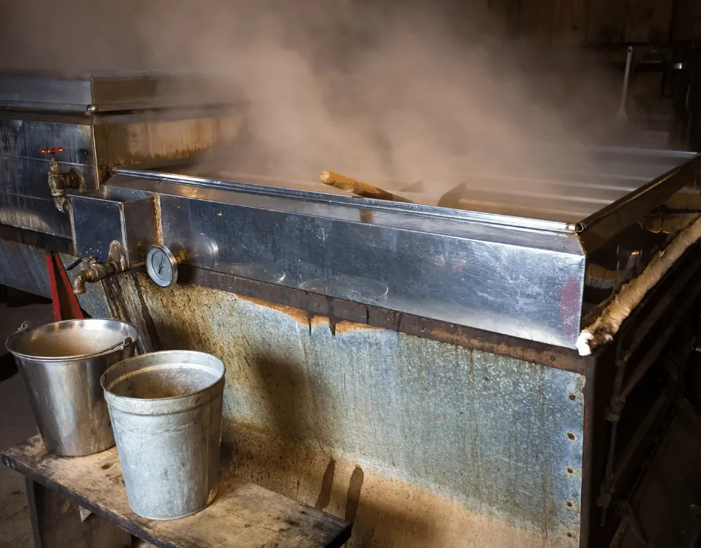 cooking maple syrup in metal cooker