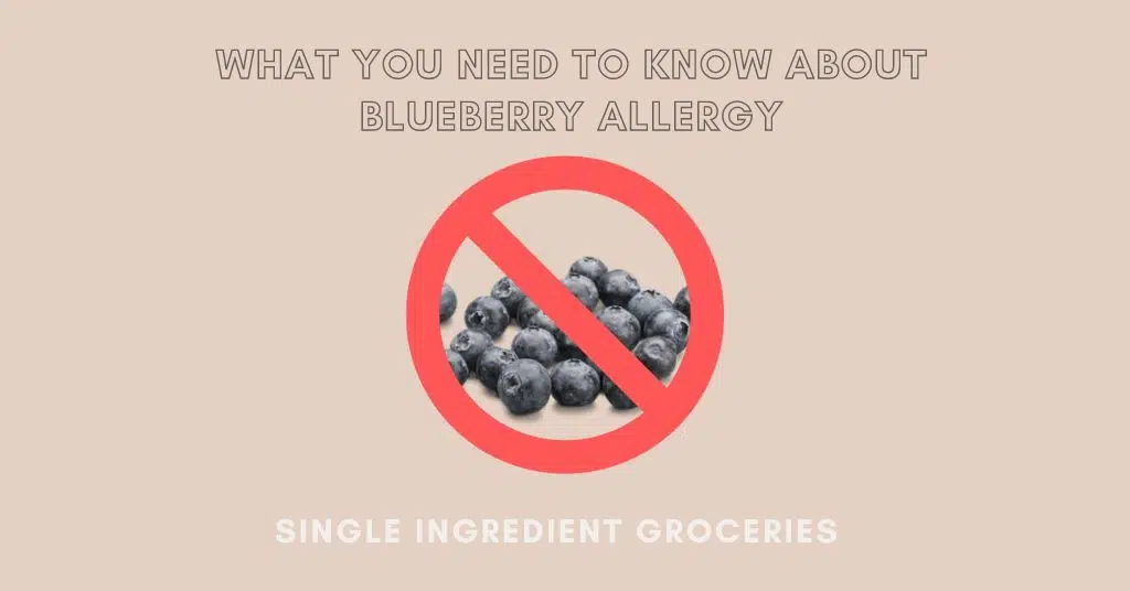 Blueberries on a tan background with red prohibited sign crossing them out with title "What you need to know about blueberry allergy" for Single Ingredient Groceries.
